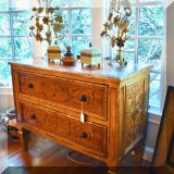 F27. Two-drawer chest with scrollwork decoration. 34”h x 43”w x 21”d 